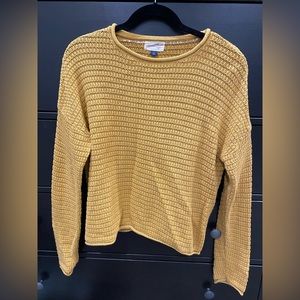 Mustard yellow sweater. Size medium.